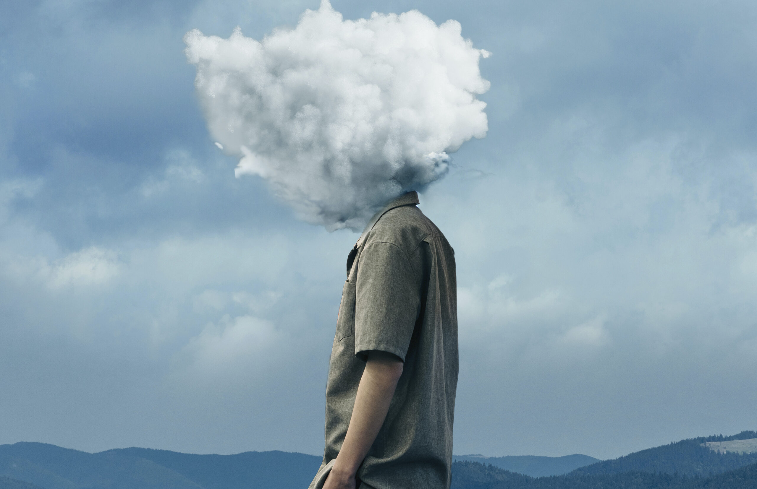 Man with cloud on his head which represents overcoming trauma